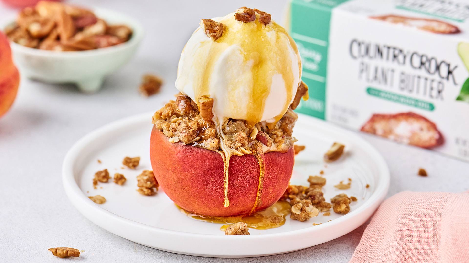 recipe image Country Crock Stuffed Baked Peaches with Dairy-Free Streusel